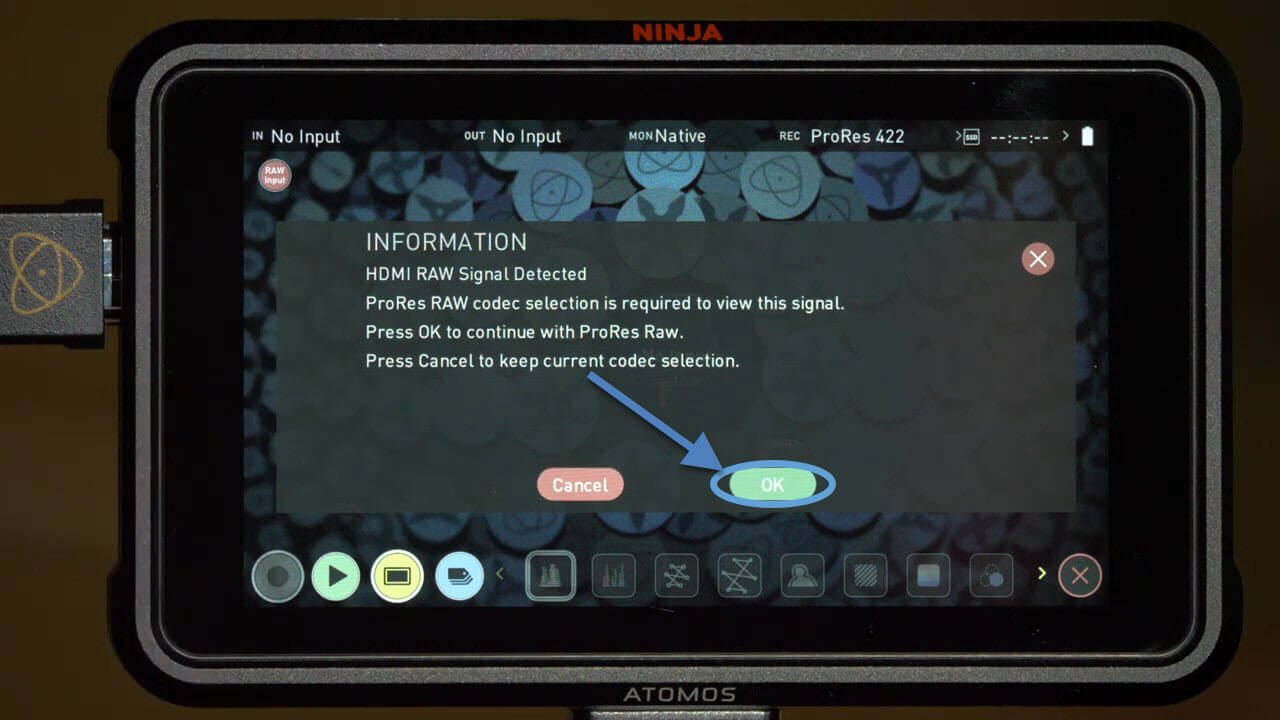 Step 5: Image with the ok button on the Atomos Ninja V highlighted. This image is to be used in tandem with the instructions paired with it.