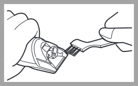 Image of brushing off trimmings as described in Step 2