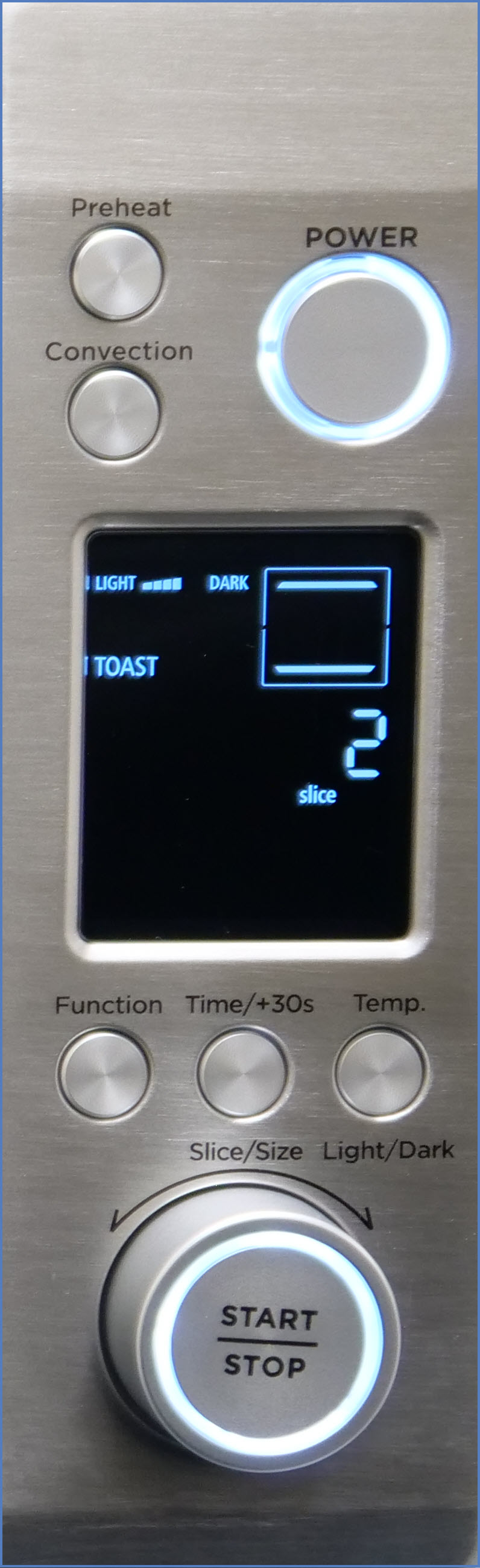 Toaster Oven Model NB-G251 control panel. Control panel reads toast